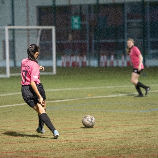 girls football trials player passing during match