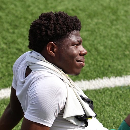 football player resting on the training pitch